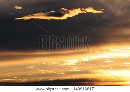Golden sunrise on a summer morning after a storm