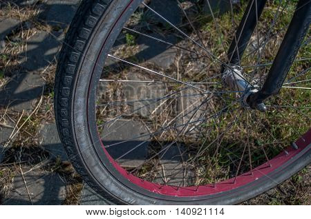 close-up of bicycle wheel and wheel spokes
