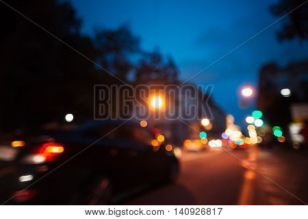 City road motion blur. Night background. Bokeh effect. Flashing lights. Motion on street.
