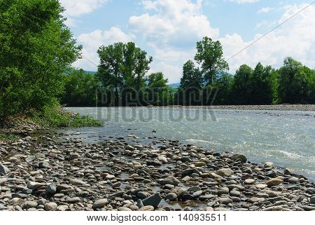 Waves on a mountain river in summer. Caucasus