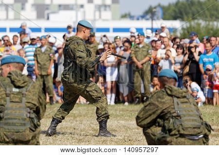Ulyanovsk Russia - July 31 2016: Demonstrations of soldiers during the celebration of the Airborne Forces. Soldier demonstrates possession of nunchaku.