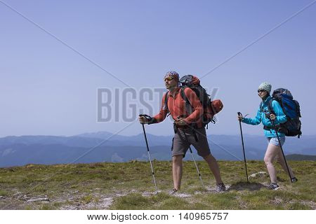 Hiking in the mountains in the summer on a sunny day.