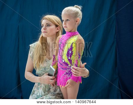 Warsaw Poland - June 25 2016:A coach provides the last minute tips and hints before the gymnastics show