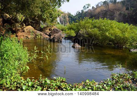 Da Nhim river near pongour vietnam in dry season with rock on the bottom of the stream