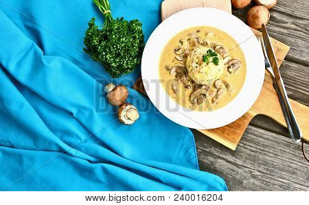Sour Mushroom Sauce With Bread Dumpling (german Name Is Saure Schwammerlso
