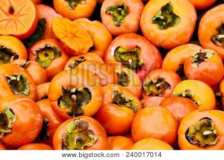 A Lot Of Persimmon Or Persimon In The Market  With Full Frame.