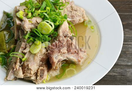 Hot And Spicy Pork Bone Hot Pot With Lime And Thai Herbs.(thai Name Is Tom Saep Or Tom Yum Kraduk Mo