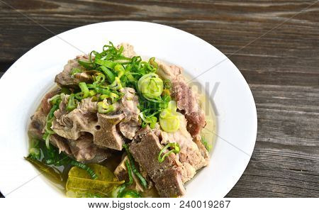 Hot And Spicy Pork Bone Hot Pot With Lime And Thai Herbs.(thai Name Is Tom Saep Or Tom Yum Kraduk Mo