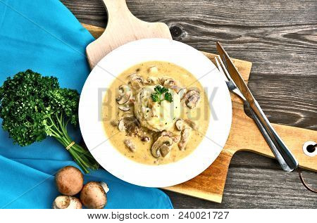 Sour Mushroom Sauce With Bread Dumpling (german Name Is Saure Schwammerlso