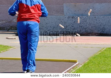 Gorodki - A Russian Folk Sports Game. In This Game You Need Specific Distances To Smash Figures Made