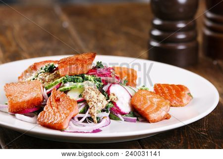 Red Fish Salmon With Radish And Spinach, Served On White Plate On Wooden Table. Rustick Style. View 