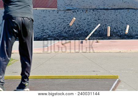Gorodki - A Russian Folk Sports Game. In This Game You Need Specific Distances To Smash Figures Made