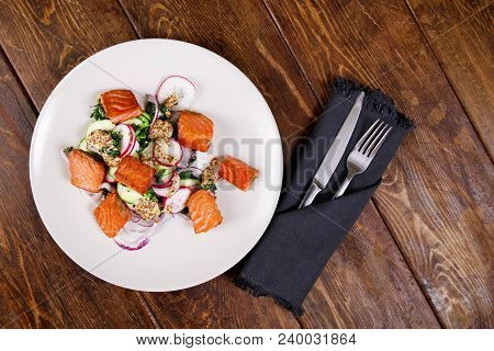 Red Fish Salmon With Radish And Spinach, Served On White Plate On Wooden Table. Rustick Style. View 