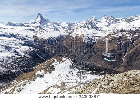Zermatt, Switzerland - April 12, 2017: The Blauhorn-rothorn Cable Car Leaving The Station With The M