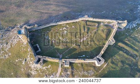 Roman Ruins Of Enisala Citadel. Dobrogea Romania. Aerial View.
