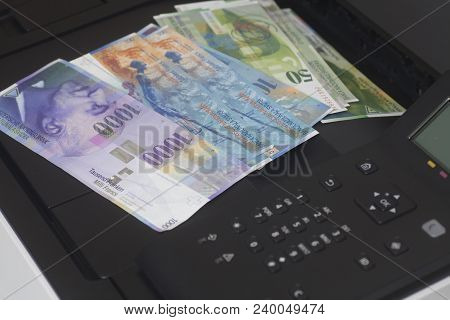 Printer And Swiss Francs, Currency Of Switzerland Close Up