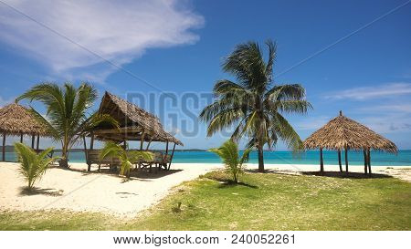 Beach With White Sand With Beach House On A Tropical Island Daco. Beautiful Sky, Sea, Resort. Seasca