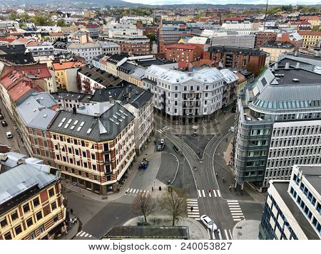 OSLO - MAY 7, 2018: Aerial view above rooftops and city streets in central Oslo, Norway.