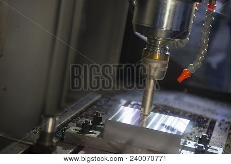 The Cnc Milling Machine Cutting The Metal Injection Mold Part With The Square Index-able  Tool. High