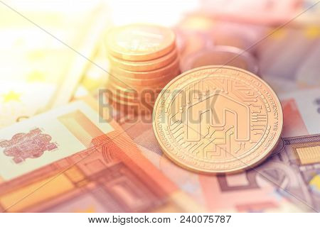 Shiny Golden Mcap Cryptocurrency Coin On Blurry Background With Euro Money Token