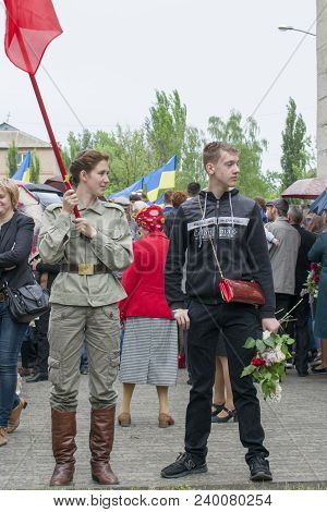 Ukraine, Kiev - 05.9.2016: People Celebrate The Day Of Victory In The Streets Of The City, A Militar