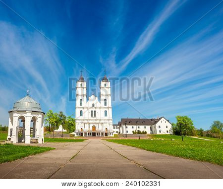 Beautiful White Chatolic Church In Latvia ,aglona, Nice Blue Sky And White Clouds