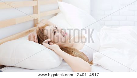 Woman Wake Up On Bed In The Morning