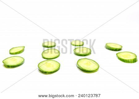 Oval Cucumber On A White Background The Bottom View , Beauty And Health