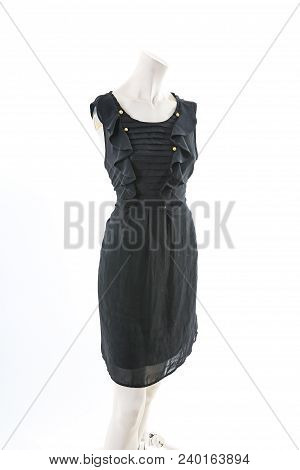 Black Mini Dress On Headless Mannequin Cloth Display Dressmaker Doll Figurine. Fashion Designer Clot
