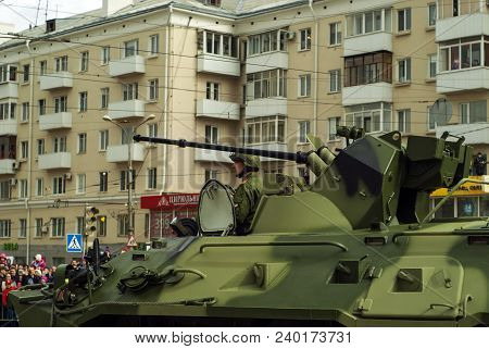 Perm, Russia - May 09, 2018: Btr-82a Armored Personnel Carrier With A Crew On A City Street After Th