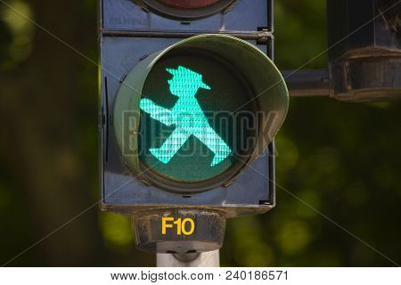 Berlin, Germany - June 11, 2913: Detail Of Pedestrian Traffic Light Showing Emblematic Berlin Green 