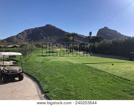 Camelback Mountain in Phoenix, Scottsdale, Az, surrounded by luxury homes and golf courses.