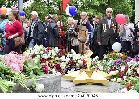 Ukraine, Kiev - 05.9.2016: People Celebrate The Day Of Victory In The Streets Of The City, A Militar