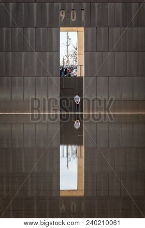 Oklahoma City, Oklahoma / Usa - March 31, 2018: Lone Man And His Reflection In The Shallow Water Poo