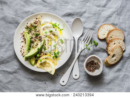 Greek Yogurt, Avocado, Quinoa, Zaatar Spice Snack Bowl On Grey Background, Top View. Healthy Diet Fo