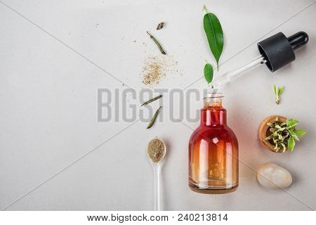 The Minimal Style. Natural Cosmetics, Handmade Skin And Body Care. Orange Bottle With Piped And Vege