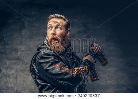 Emotional, Funny Redhead Bearded Drunk Hipster Male Holds Craft Bottled Beer.