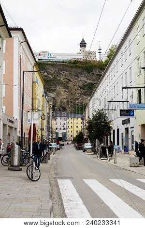 Salzburg, Austria - Circa Oct 2017: Street In Old Part Of Salsburg. Carriageway, Buildings And Pedes