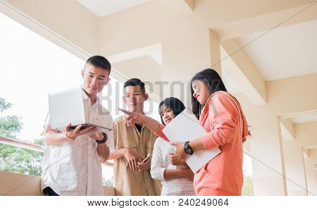 Education Learning Concept : Students Or Startup Business Young  Asian College Groups Using Tablet T