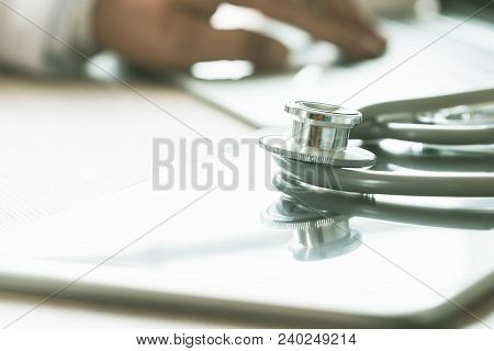 Healthcare And Medical Concept, Doctor Working Seaching Information Patient Database Through Interne