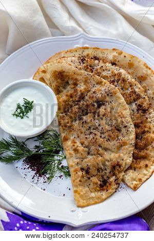 Azerbaijani Traditional Cuisine. Horizontal Shot Of Qutabs -flatbread With Greens. Served With Yogur