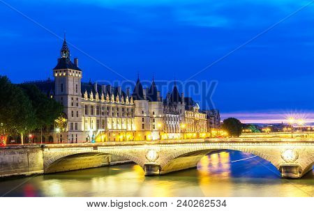 The Night In Paris, Change Bridge And Conciergerie, Paris. France