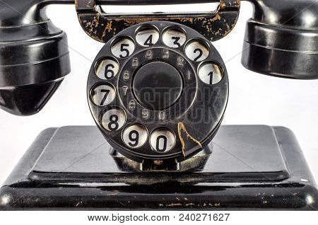 Disk Dialer Of Old Vintage Black Phone Close-up