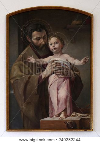 HINTERBRAND, GERMANY - JULY 04: Saint Joseph holding child Jesus, altarpiece in chapel in Hinterbrand, Germany on July 04, 2017.