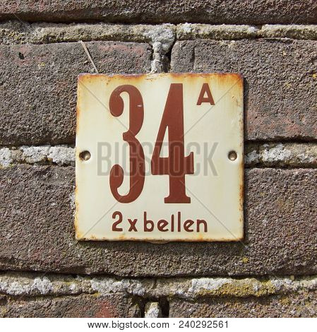 House Number Thirty Four A  - 34 A And Text: Call 2 Times (dutch: 2 X Bellen)