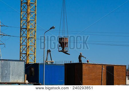 Lots Of Tower Construction Site With Cranes And Building With Blue Sky Background