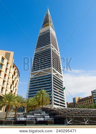 RIYADH - AUGUST 22: Sunset light at Al Faisaliah tower facade on August 22, 2016 in Riyadh, Saudi Arabia. Al Faisaliah towers is a luxury hotel and the most distinctive skyscraper in Saudi Arabia