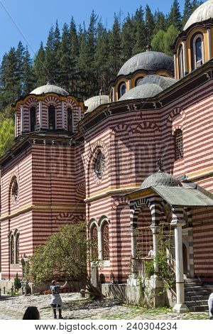 Rila Monastery, Bulgaria - April 21, 2018: Tourists Visiting Monastery Of Saint Ivan (john) Of Rila 