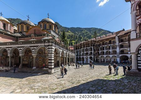Rila Monastery, Bulgaria - April 21, 2018: Tourists Visiting Monastery Of Saint Ivan (john) Of Rila 