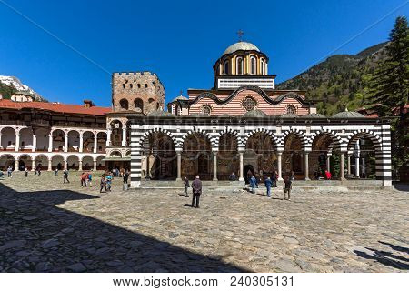Rila Monastery, Bulgaria - April 21, 2018: Tourists Visiting Monastery Of Saint Ivan (john) Of Rila 